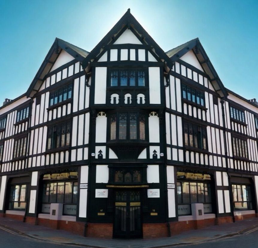 The Hair and Beauty College, the black and white Tudor-style corner building at 78 Bridge Street, Warrington